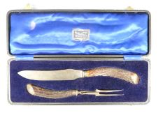 Hallmarked silver mounted horn handled carving set, Sheffield 1931 makers mark TEO, in Oswin & Co.