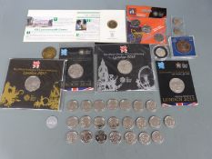 A collection of sporting related coins to include Olympics, off-side rule 50p, Commonwealth Games