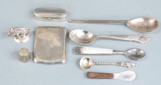 Three hallmarked silver and white metal spoons, hallmarked silver match case and a silver lidded