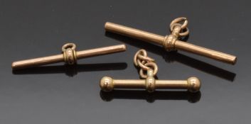 A 9ct gold T bar, maker C.D.B and two yellow metal T bars, 4.4g