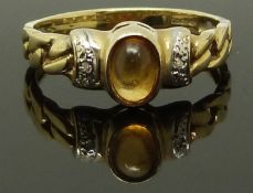 A 9ct gold ring set with a citrine and diamonds, size N, 1.86g
