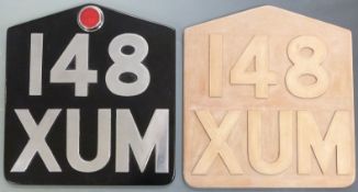 Aluminium novelty oversized motorcycle number plate, height 35cm together with a wooden casting
