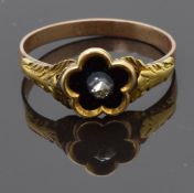 Georgian / Victorian ring in the form of a flower set with black enamel and a rose cut diamond