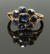 Victorian/ Edwardian yellow metal ring set with a cluster of sapphires, size K/L, 3.30g