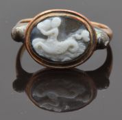 Georgian / Victorian yellow metal ring set with a cameo depicting a merman playing a conch shell,