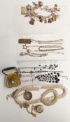 A collection of silver jewellery including charm bracelet with over 18 charms, gate bracelet,