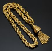 A 19thC yellow metal rope twist leontine/ fob chain with a tassel, 13.7g