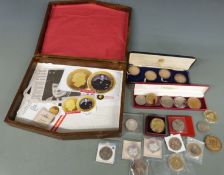 A collection of Sir Winston Churchill related coins and medal coins, includes a deluxe cased Toye