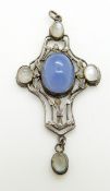 Arts and Crafts pendant set with a blue agate and moonstone cabochons