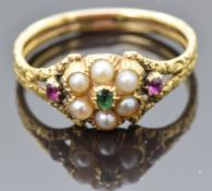 Victorian ring set with an emerald, split pearls and rubies with an engraved band, size N