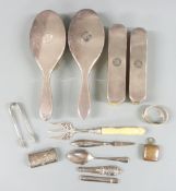 Four hallmarked silver mounted dressing table brushes, Mappin & Webb hallmarked silver ivory handled