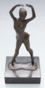 Bronze figure of a ballet dancer with impressed 