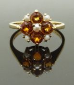 A 9ct gold ring set with pearls and citrine, size L, 2.43g