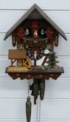 Swiss made 20thC three train cuckoo clock with musical movement on the hour and half hour and