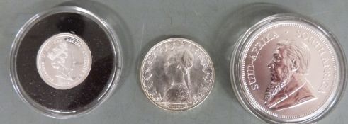 South African Mint one ounce silver Krugerrand with certificate together with an Alderney proof