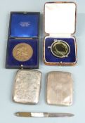Two hallmarked silver cigarette cases, weight 108g, Ilford camera filter in case, Cheltenham