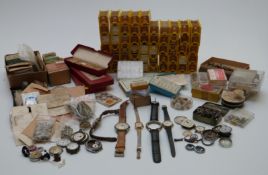 A large quantity of wristwatch parts including many new boxed and cased together with a selection of