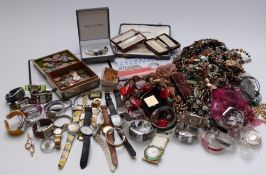 A large collection of costume jewellery, coins and watches including Swatch, beads, etc