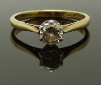 An 18ct gold ring set with a round cut diamond of approximately 0.5ct, size O, 2.99g