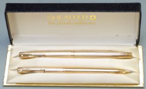 Sheaffer fountain and ballpoint pen set with 14ct gold nib and white dot clips, in original fitted