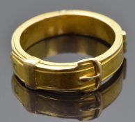 Victorian 18ct gold buckle ring opening to reveal a band of plaited hair, inner band inscribed 