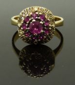 A yellow metal ring set with a cluster of pink paste, size M, 4.48g