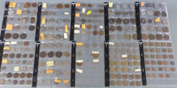 A large amateur collection of world coins, 19thC onwards in collector's folder pages, including