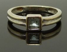 A 9ct white gold ring set with a square cut aquamarine, size L, 1.79g