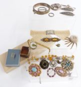 A collection of costume jewellery including brooches, silver bangle, silver ring, Art Deco collar,