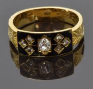 Victorian 18ct gold mourning ring set with black enamel and old cut diamonds with engraved band