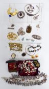 A collection of jewellery including brooch marked Boucheron Paris, silver bangles, silver brooch,