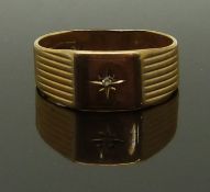A 9ct gold ring set with a diamond, size S, 3.51g