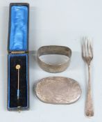 Cased gold stick pin set with a seed pearl, hallmarked silver napkin ring, hallmarked silver lid and