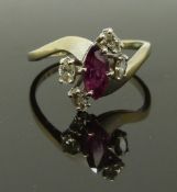 An 18ct white gold ring set with a marquise cut ruby and diamonds, in Martin & Co box, 3.1g, size O