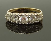 A 14ct gold ring set with cubic zirconia, the setting reading 'I love you', size N, 2.79g