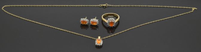 A 9ct gold suite of jewellery comprising ring, earrings and pendant set with an emerald cut fire