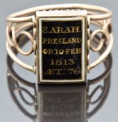 Georgian mourning ring set with plaited hair in a glass compartment surrounded by foiled paste,