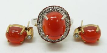 A 9ct white gold ring set with a Mexican fire opal cabochon and diamonds and a pair of 9ct gold