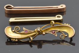 Two 9ct gold brooches and a 9ct gold brooch set with paste, 4.2g