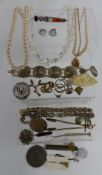 A collection of costume jewellery including brooches, Victorian brooch, locket, medallion, etc