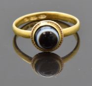 Georgian ring set with a banded agate cabochon, London 1813, size J, 1.96g