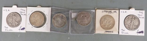 Four USA silver half dollars 1942, 1943, 1958 and 1964, together with two Canadian 50 cent
