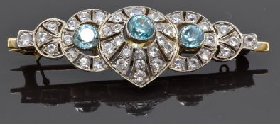 A 9ct gold brooch set with white and blue zircons, 6 x 2cm, 11.6g
