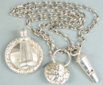 Hallmarked silver police or military whistle, comprising lions mask mount with whistle on chain