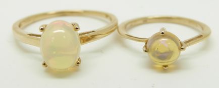 Two 9ct gold rings set with Ethiopian opal cabochons to each, 3.1g, size J & S