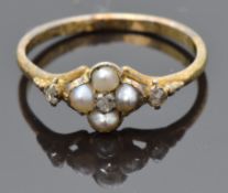 Victorian 18ct gold ring set with split pearls and rose cut diamonds, size N