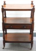 A 19thC mahogany two-tier buffet with single straight drawer, raised on turned supports and