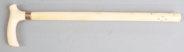 Ivory miniature walking stick with gold studded decoration formed as stars, length 16.5cm
