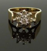 A 9ct gold ring set with diamonds in a cluster, size K, 3.67g
