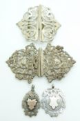 Victorian silver buckle with heart and cherub decoration (Birmingham 1898), an Edwardian silver